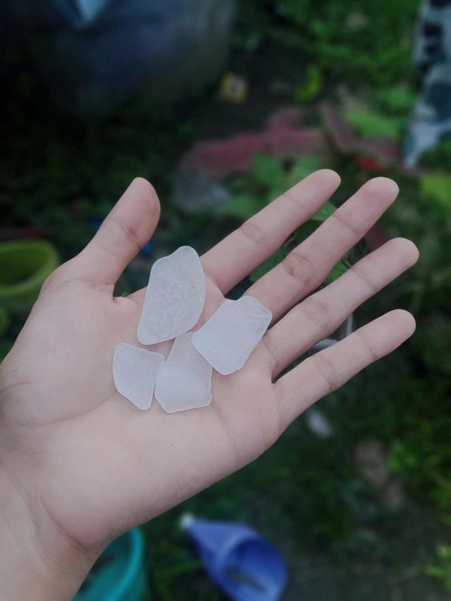 white see glass on a hand