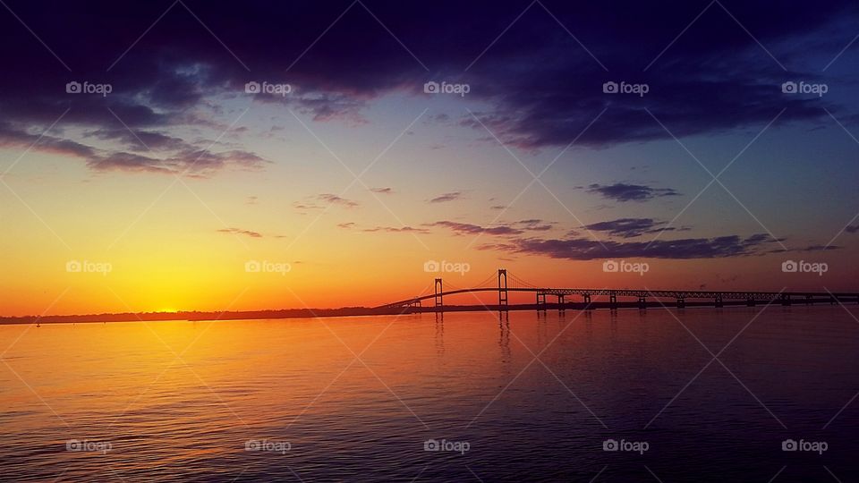 beautiful sunset and bridge over the bay