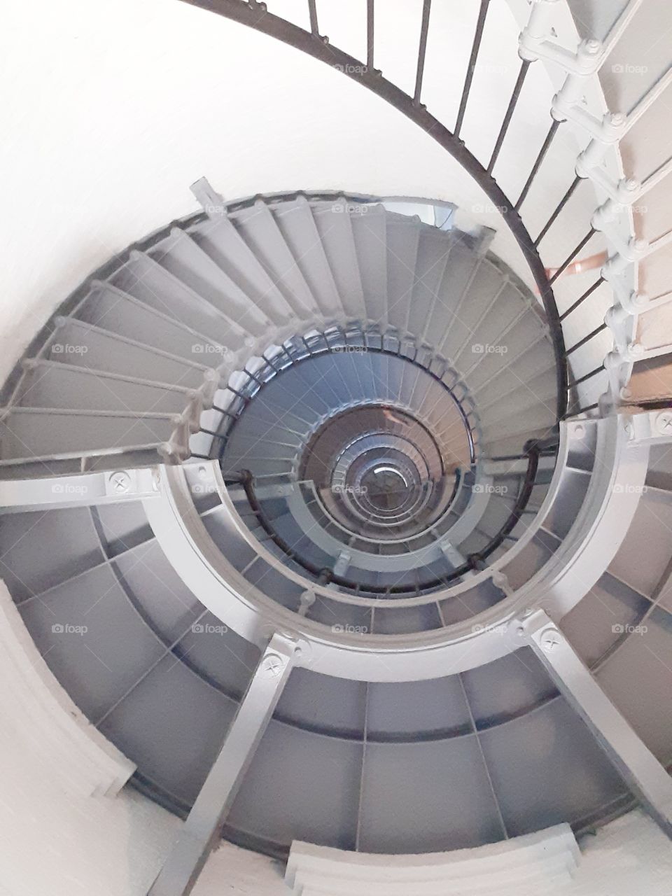 Photo of the spiral staircase from below of the Ponce Inlet Lighthouse in Ponce Inlet, Florida.