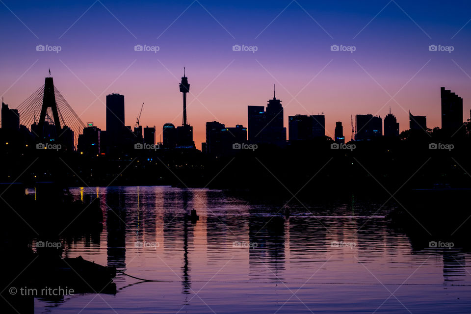 Sydney in silhouette just before the sun makes its appearance