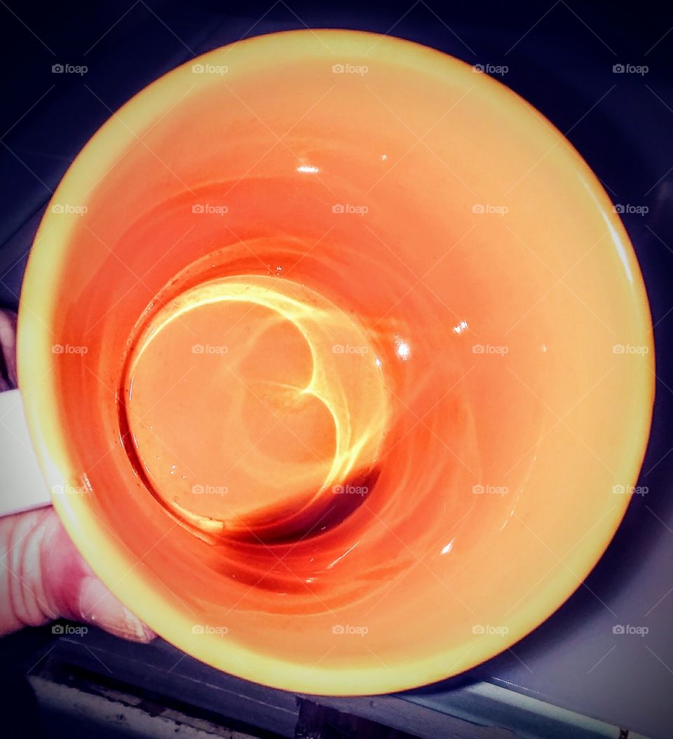 Viewer's Perspective of Inside a Coffee Mug w Drop of Coffee