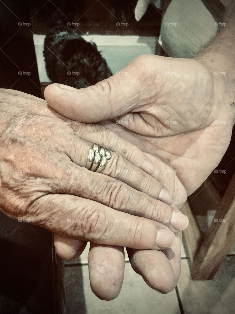 Over forty years of marriage holding hands. 