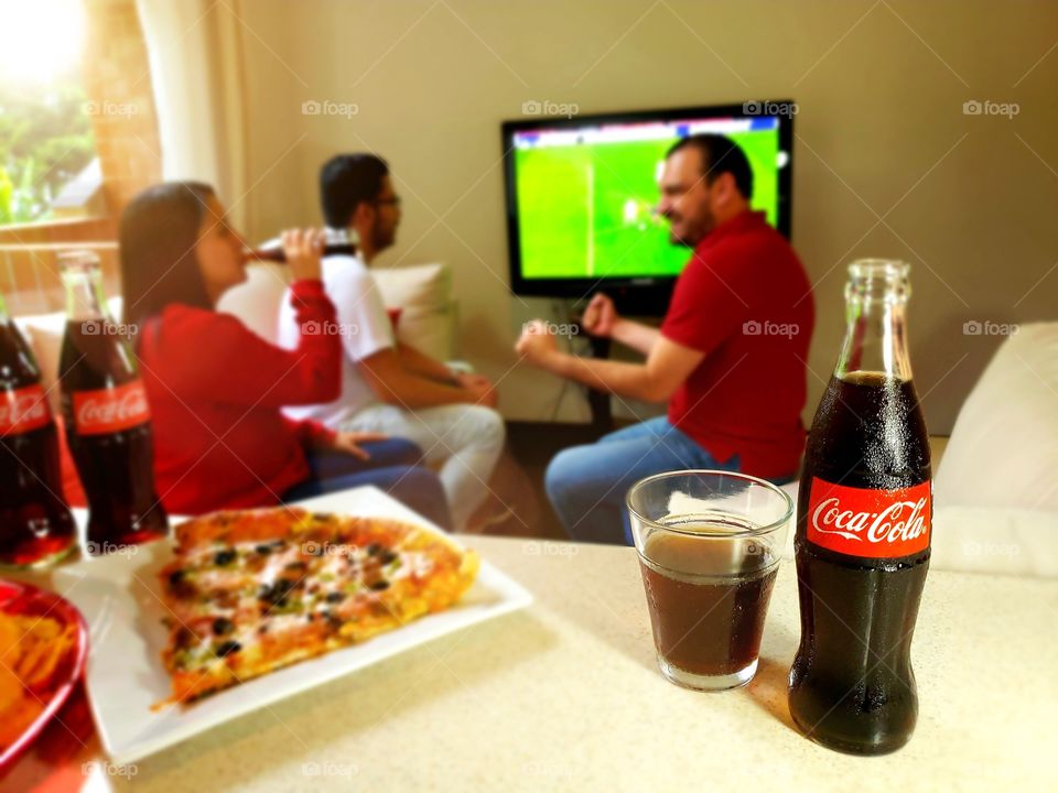 Enjoying the game with Coca Cola! 