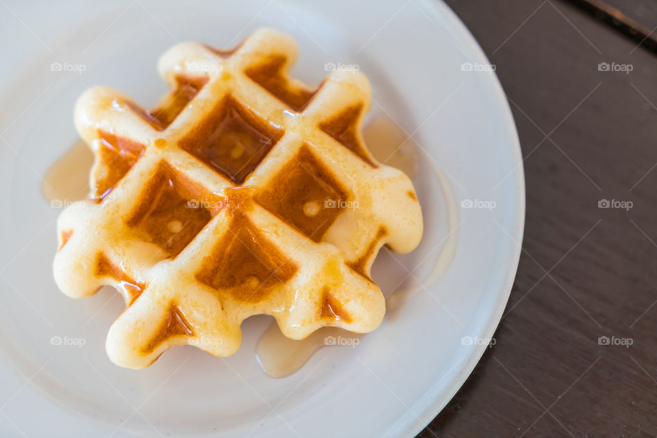 View of waffle with sirup