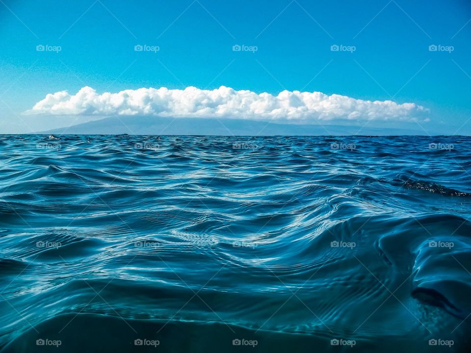 Beautiful clear blue waters of the Pacific Ocean off the coast of Maui in the Hawaiian Islands 