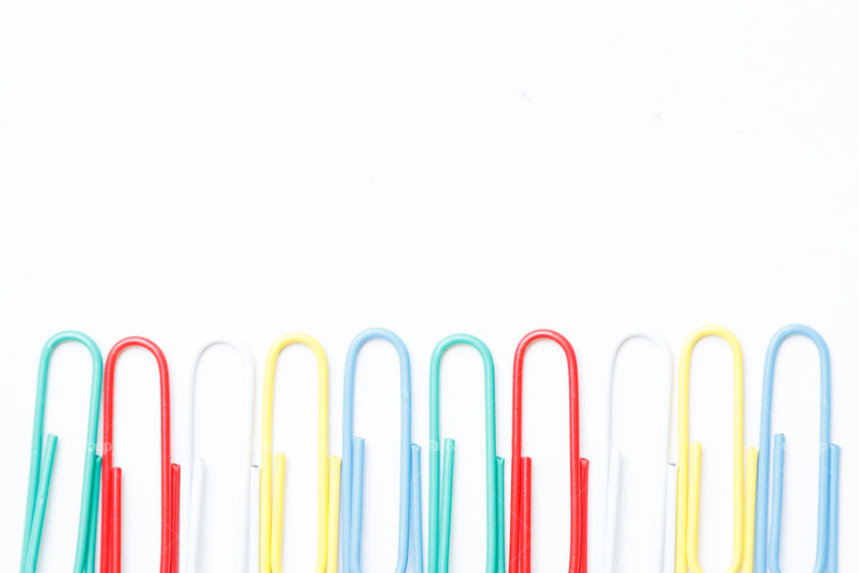 a row of colorful paperclips