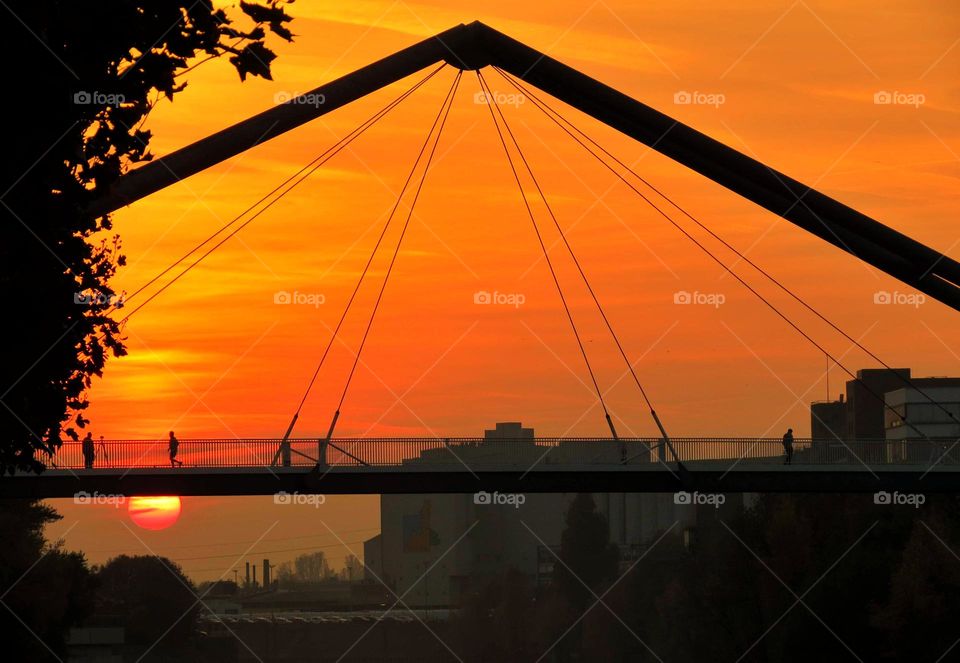 A bridge at the orange sunset