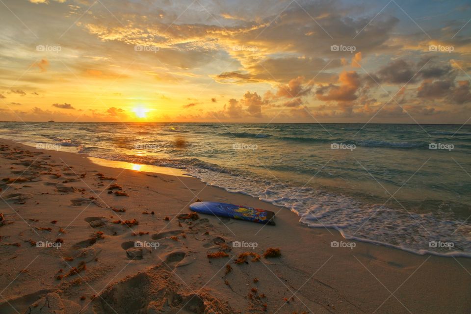 surf table in The beach at sunrise