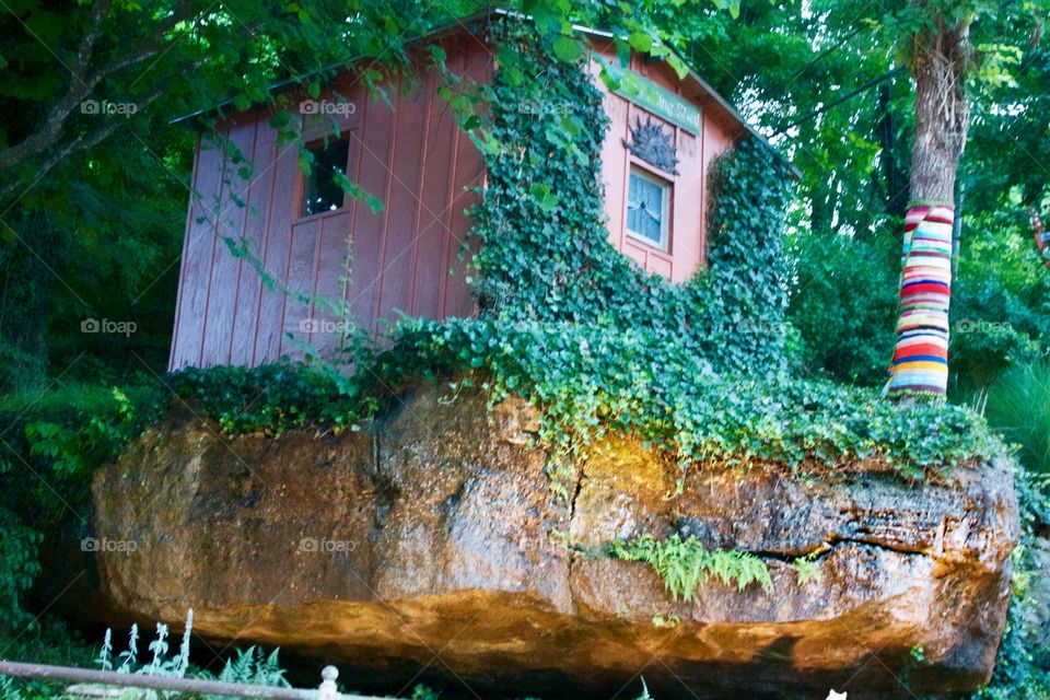 Little shed on a big rock