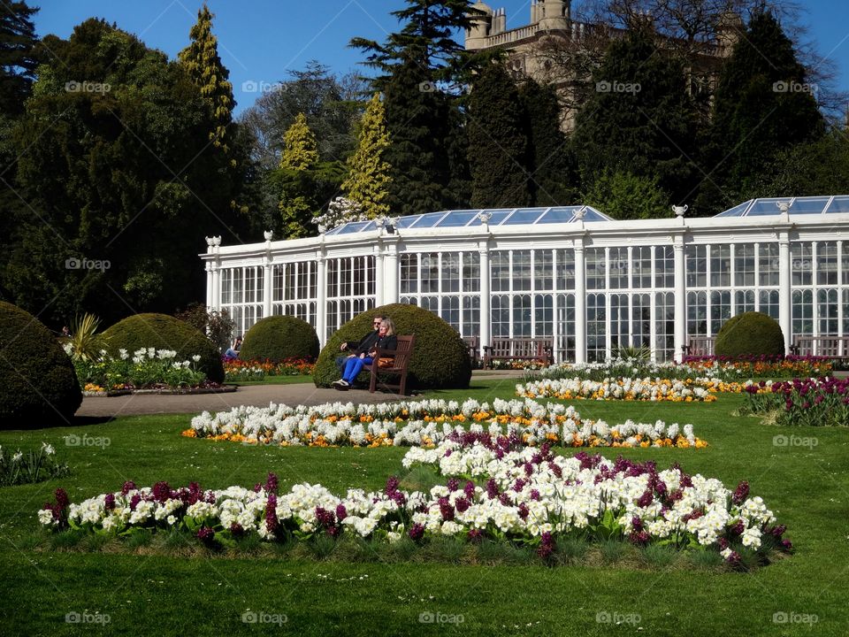 garden. Couple enjoying the spring and fresh air in garden