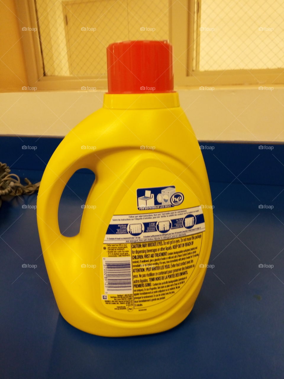 yellow bottle of detergent