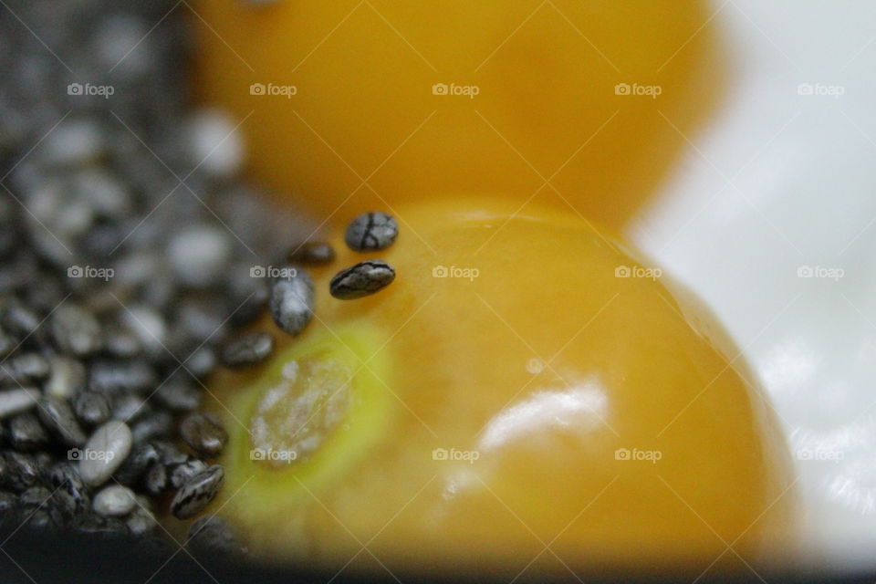 Chia seeds and golden berries close-up