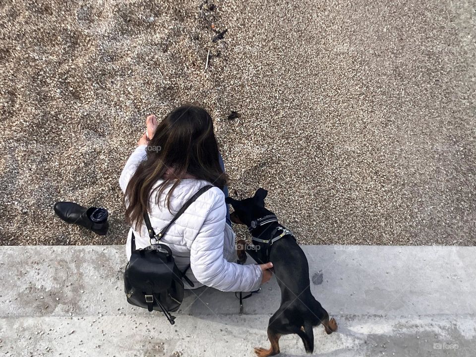 Woman with dog from above