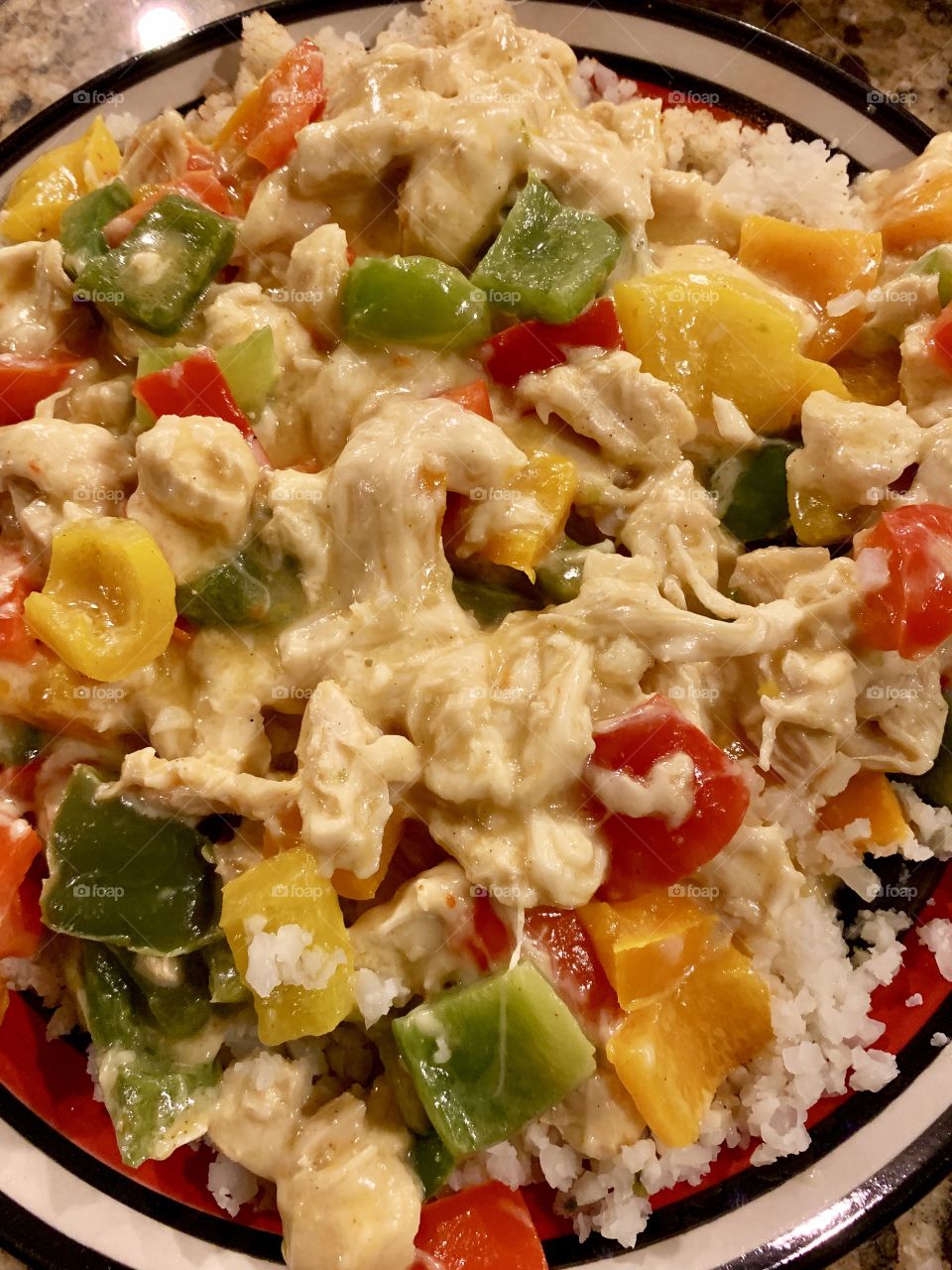 Riced Cauliflower chicken bell pepper Swiss cheese