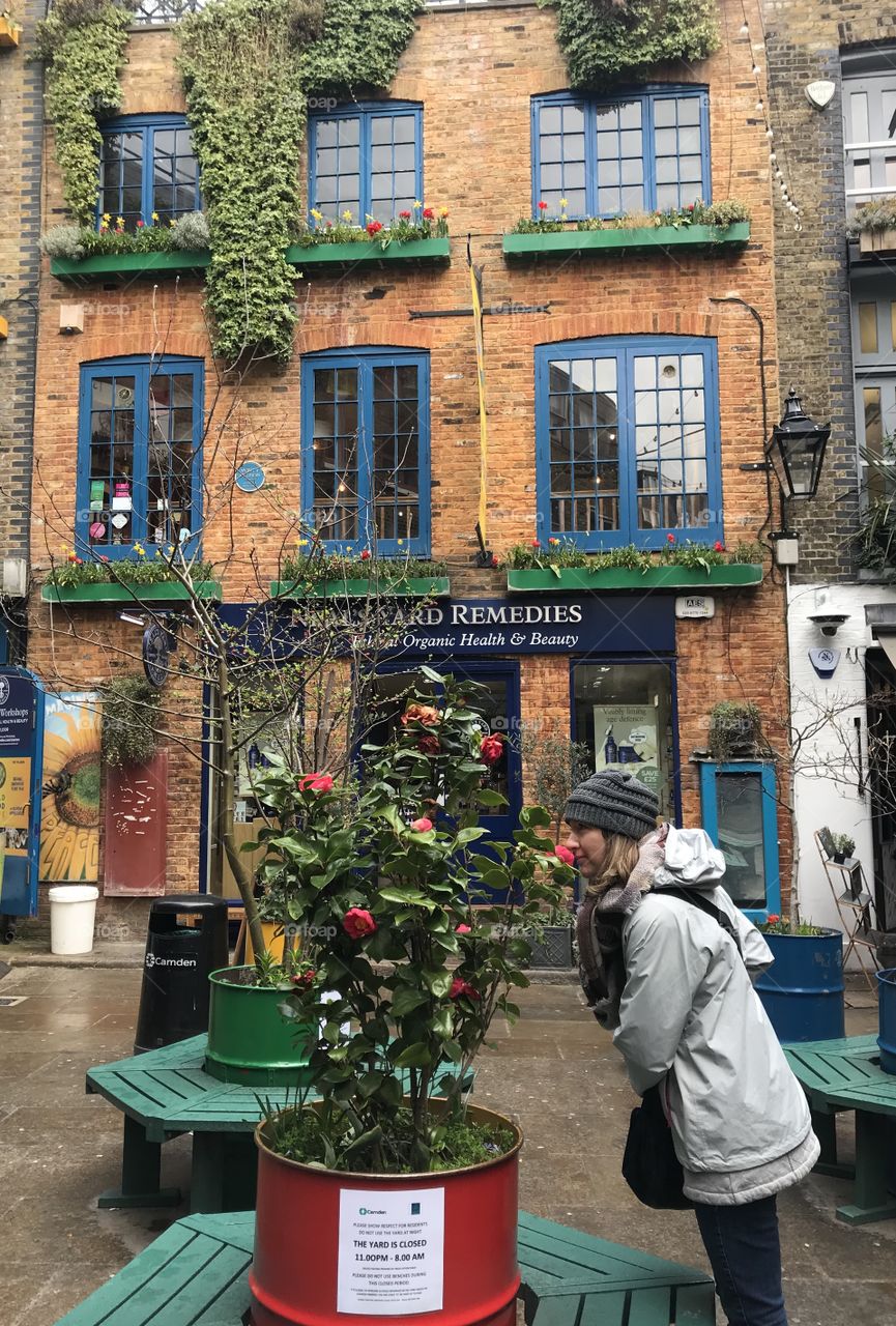 Smelling the flowers in Neal’s Yard 
