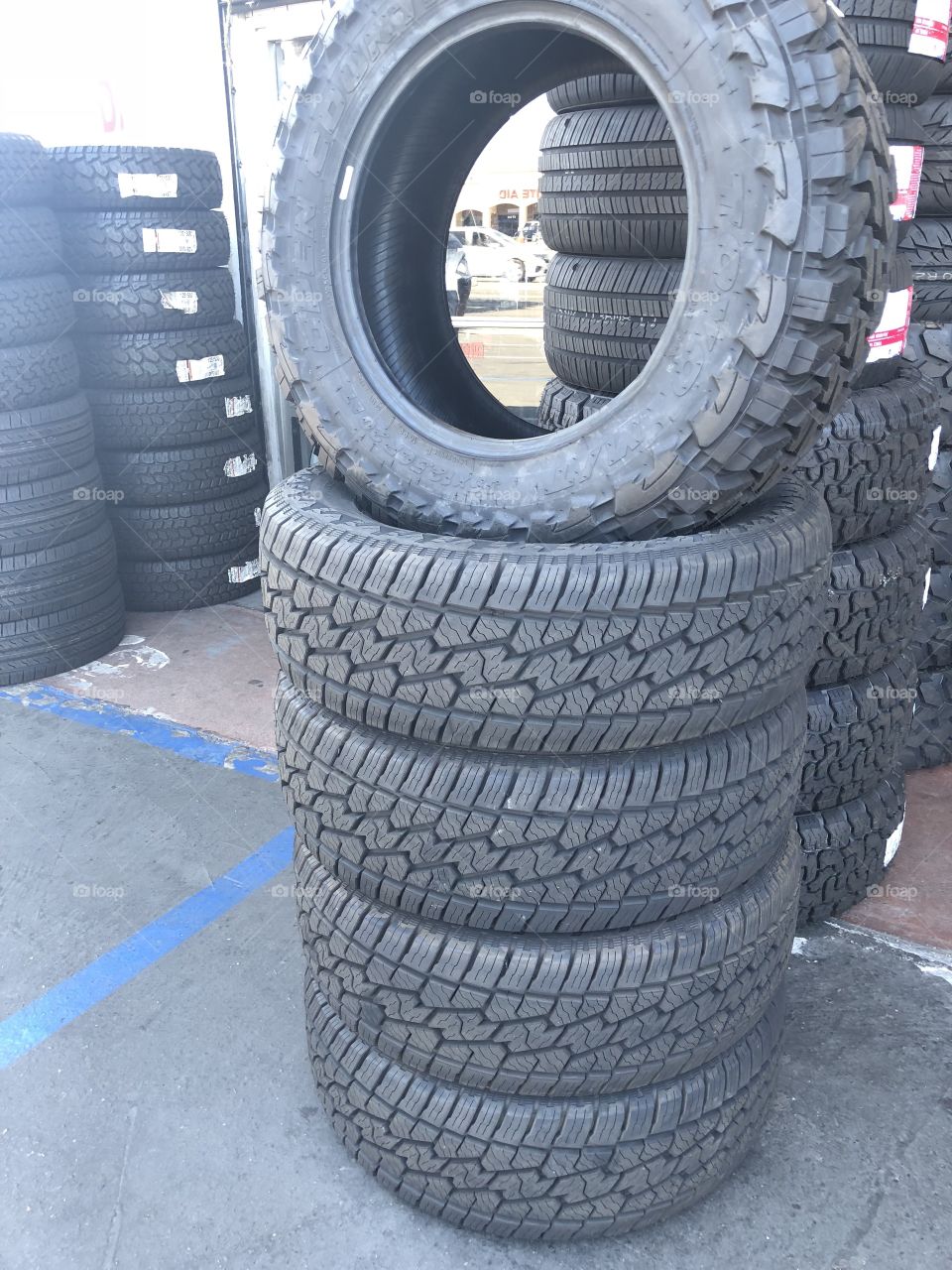 Stacked up tires at tire shop 