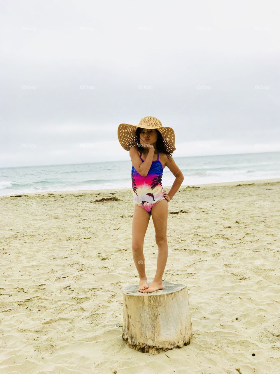 Awesome memories! On a log with a model pose.