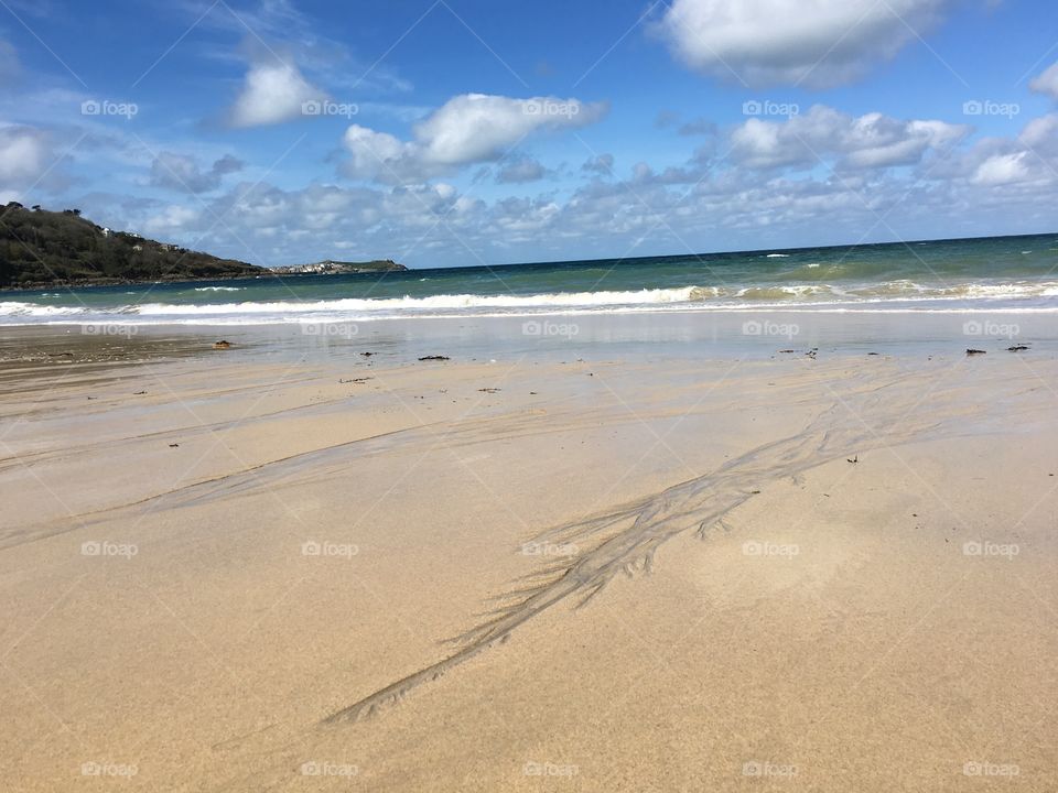 Sand patterns on Carbis Bay beach, St.Ives, England. 