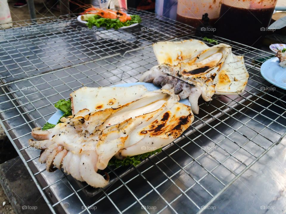 Octopuses grilled at street food sea side in Thailand 