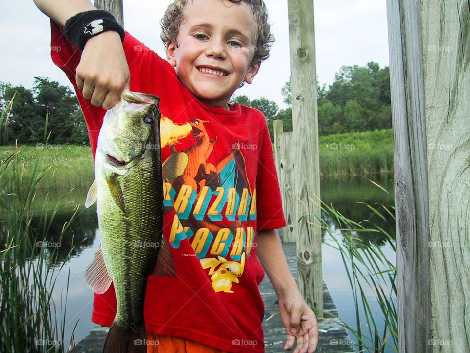 Little Fisherman- my little man loves to fish. He caught his first large mouth Bass. 