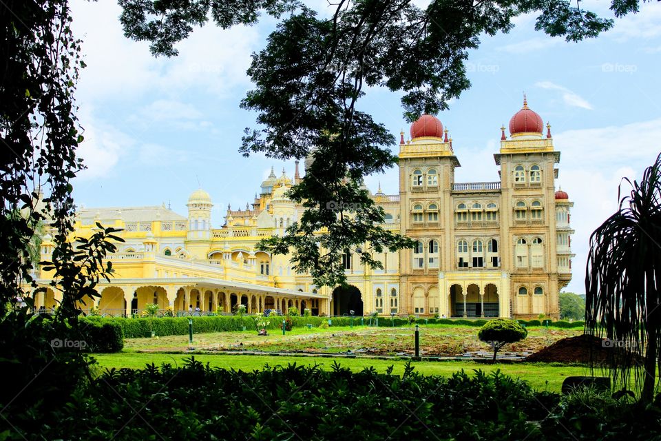 Mysore Palace, The main Attraction of Mysore and the heritage building which gives the aura of royalty to the city. The majestic palace stands at the center and the whole city has evolved and spanned all round it.