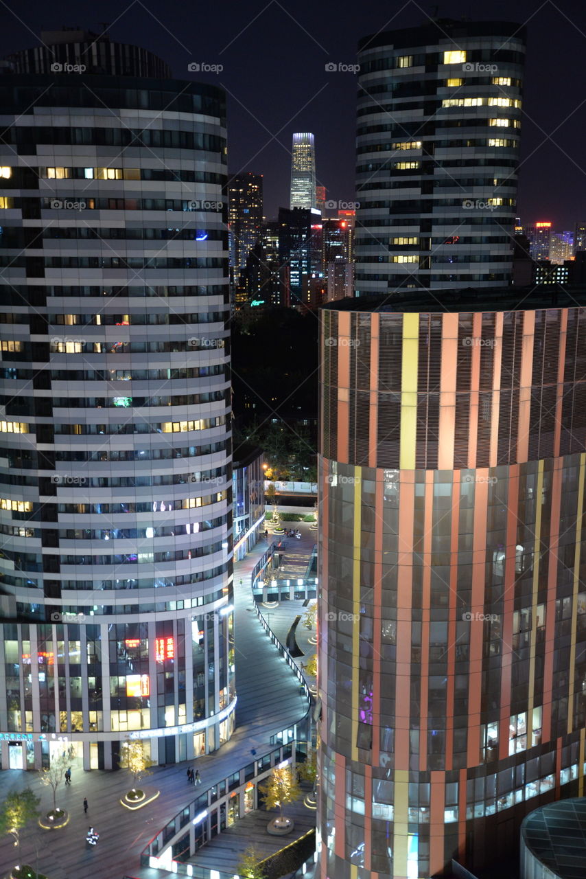 Asia China Beijing modern office building Sanlitun Sohe at night