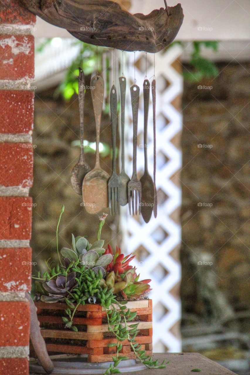 Close-up of hanging spoon