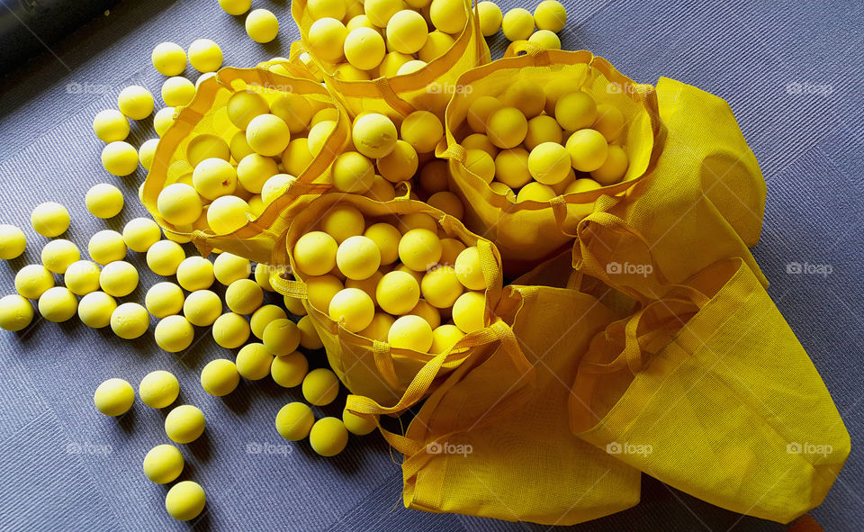 Bags full of yellow balls