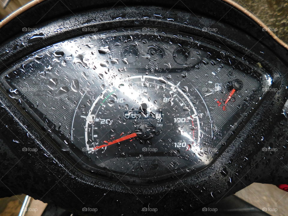 Speedometer of bike with Raindrops.