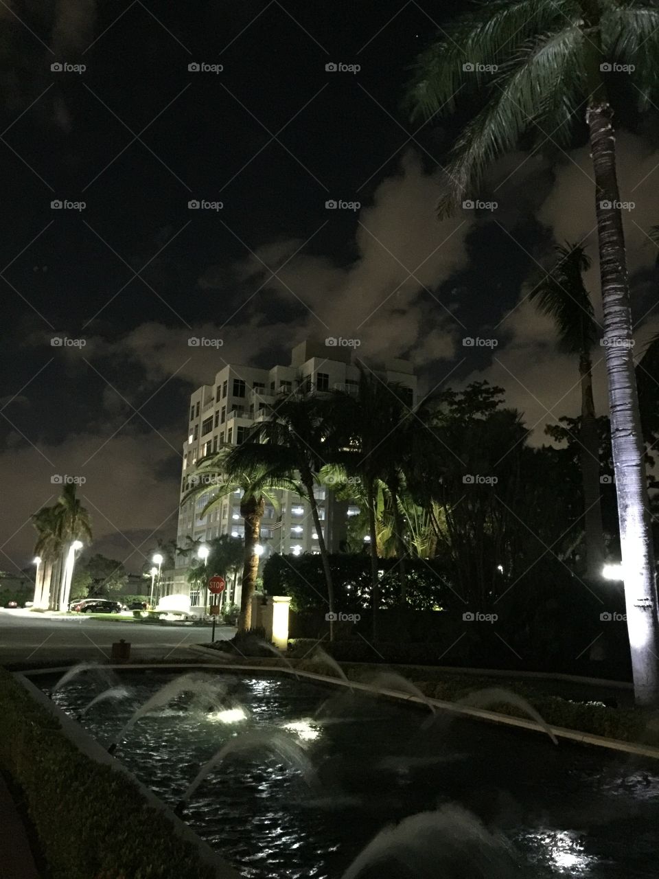 Fountain at entrance to Legends golf resort , Miami Florida, during a full moon 