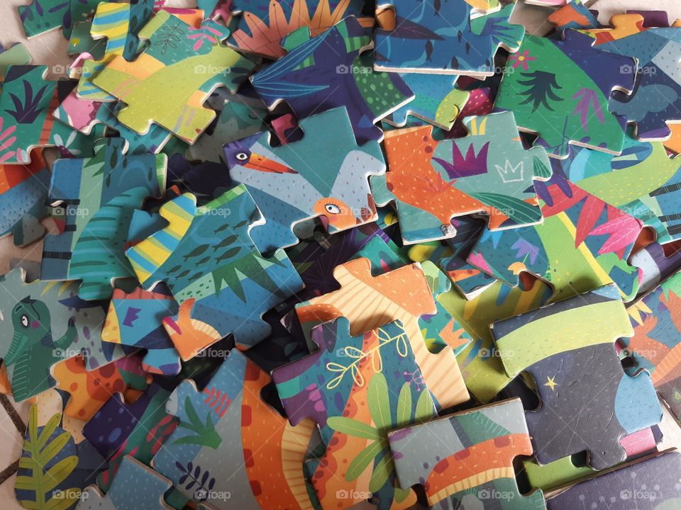 Pile of puzzles. Closeup