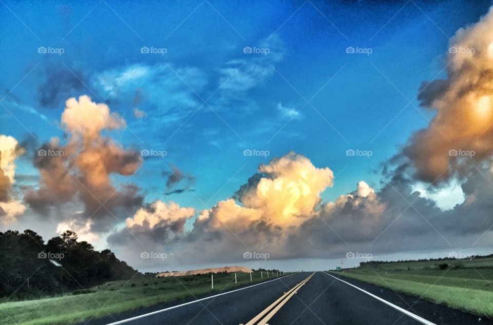 Morning drive. Puffy clouds