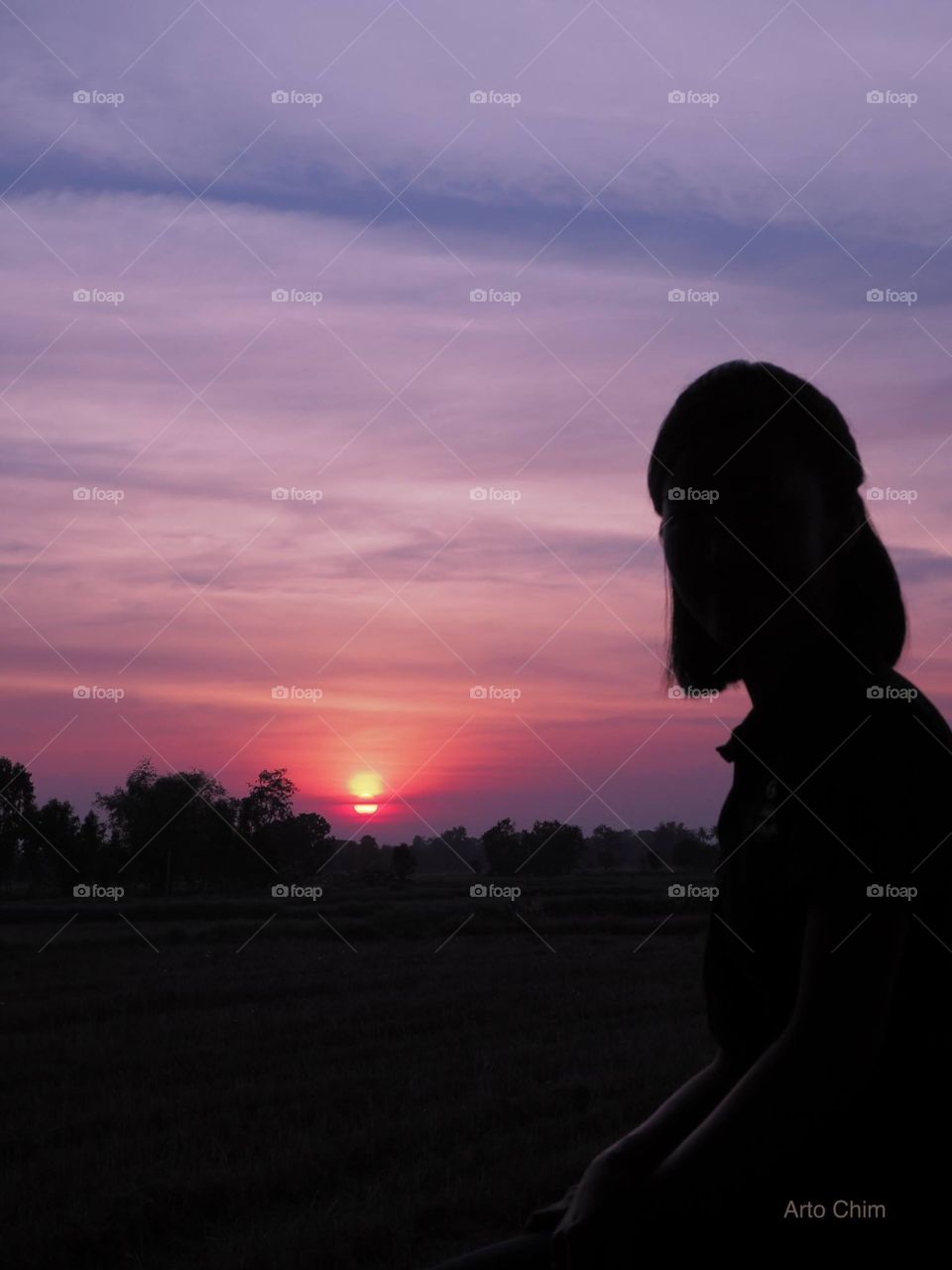 A lady with blue sunset 