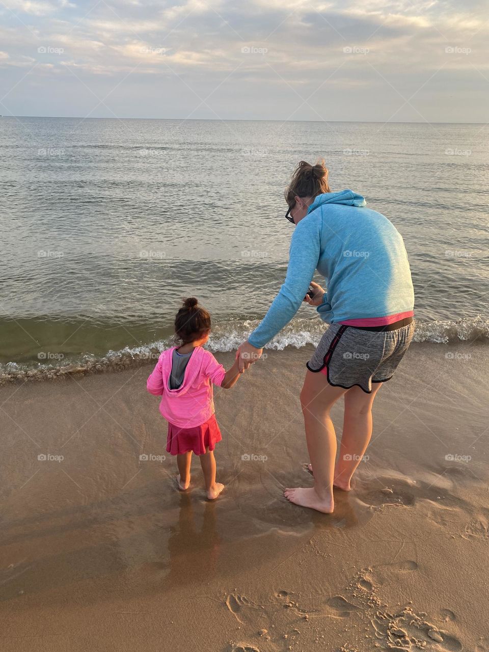 Mom & Daughter On Beach