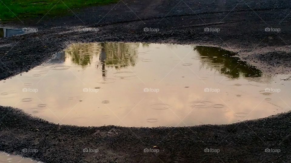 Mud Puddle. A light rain after an earlier storm. 