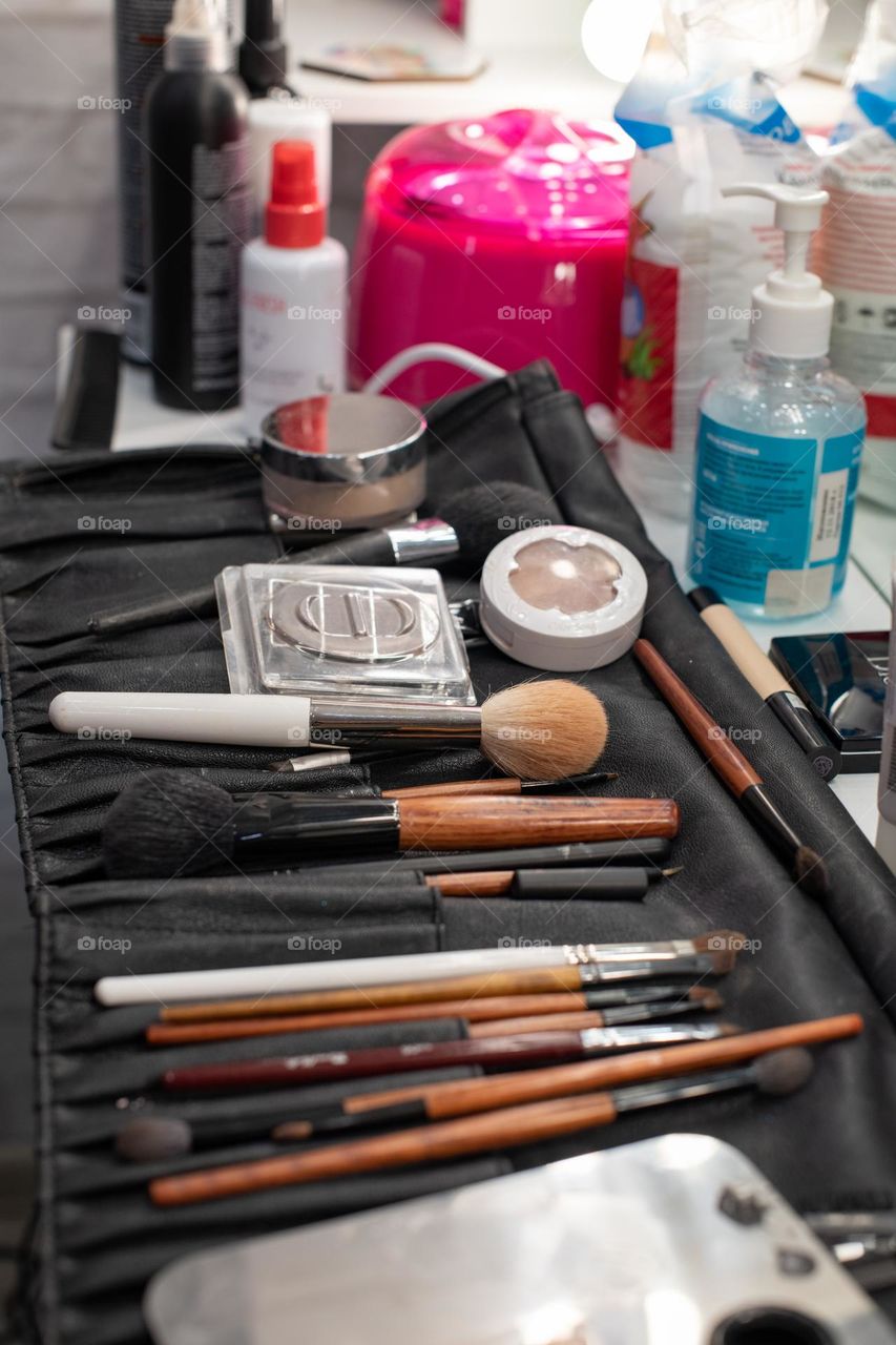 Set for professional make-up.  Brushes, shadows, glitter and mascara. Beautician job.  Beauty salon