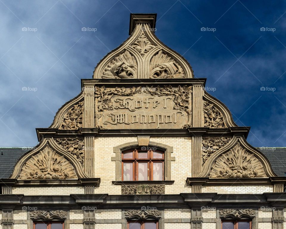 a close-up of a fragment of a beautifully made facade of a tenement house in katowice