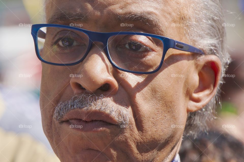 A candid portrait of Al Sharpton, USA Civil Rights Activist,  Baptist Minister and Presidential Advisor at the 2017 Annual West Indian American Day Parade, Crown Heights, Brooklyn, New York City..