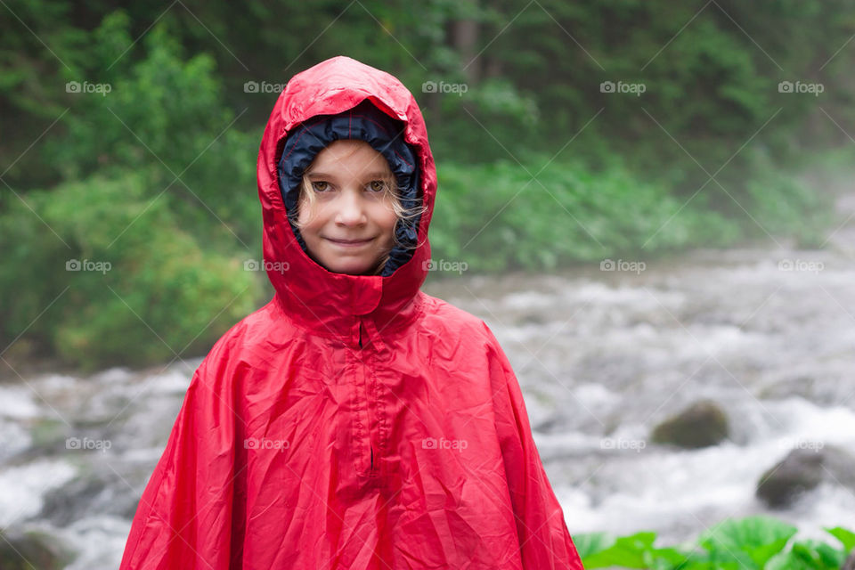 Little girl in raincoat
