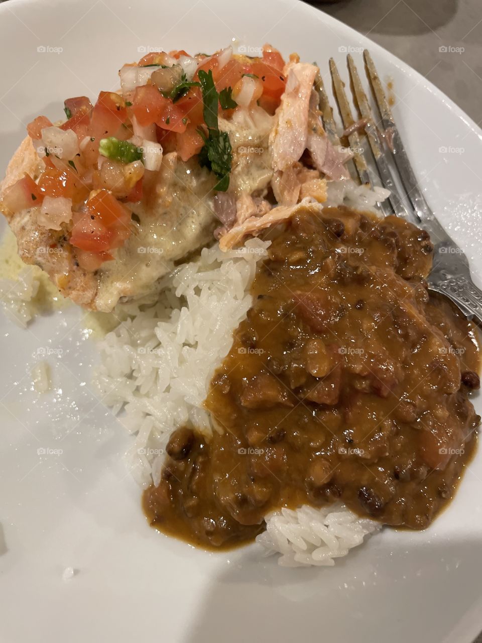 Pico topped Salmon in Cream-Sauce, Rice, and lentils