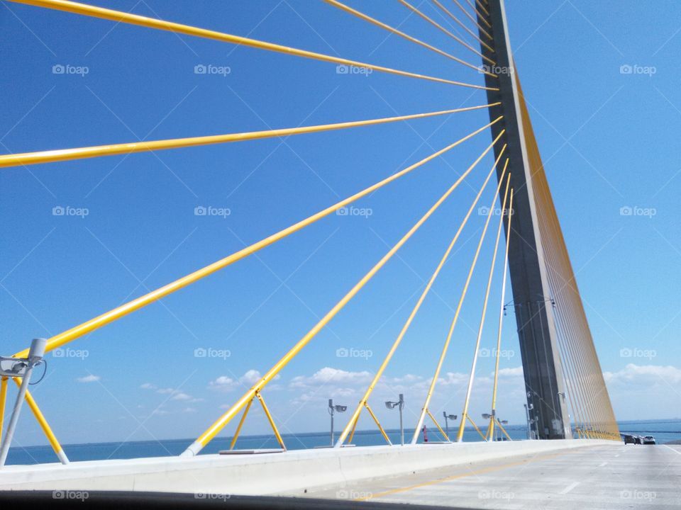 Solid Rays of Sunshine. Sunshine Skyway Bridge from a convertible