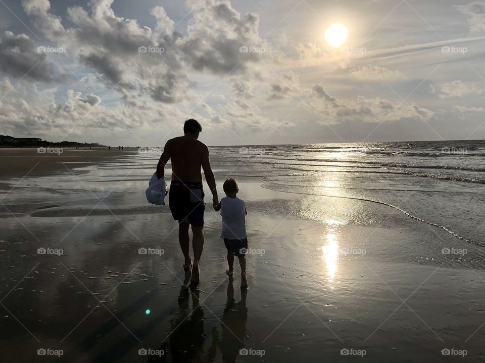 Walk with dad on the beach