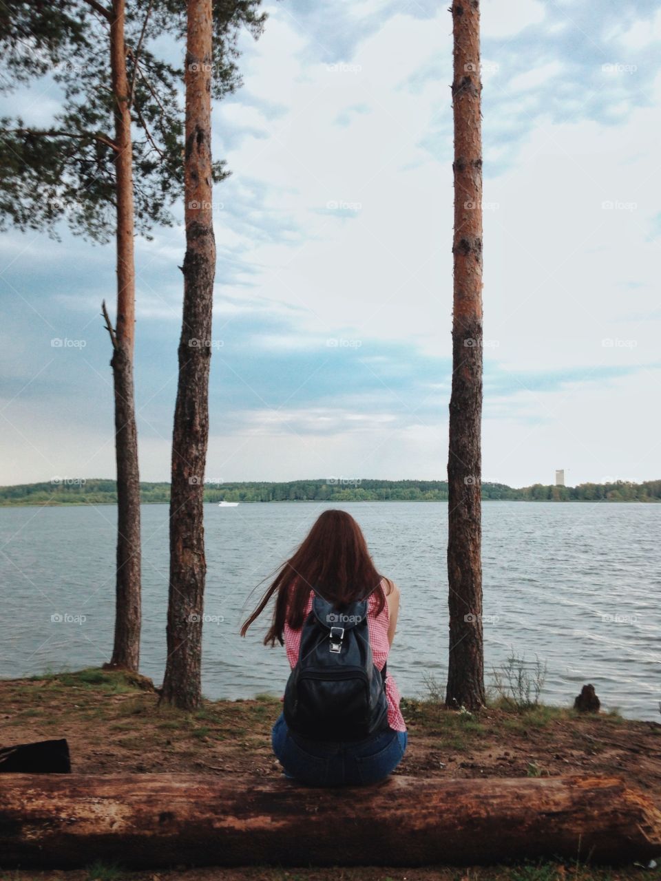 Woman looking at the lake