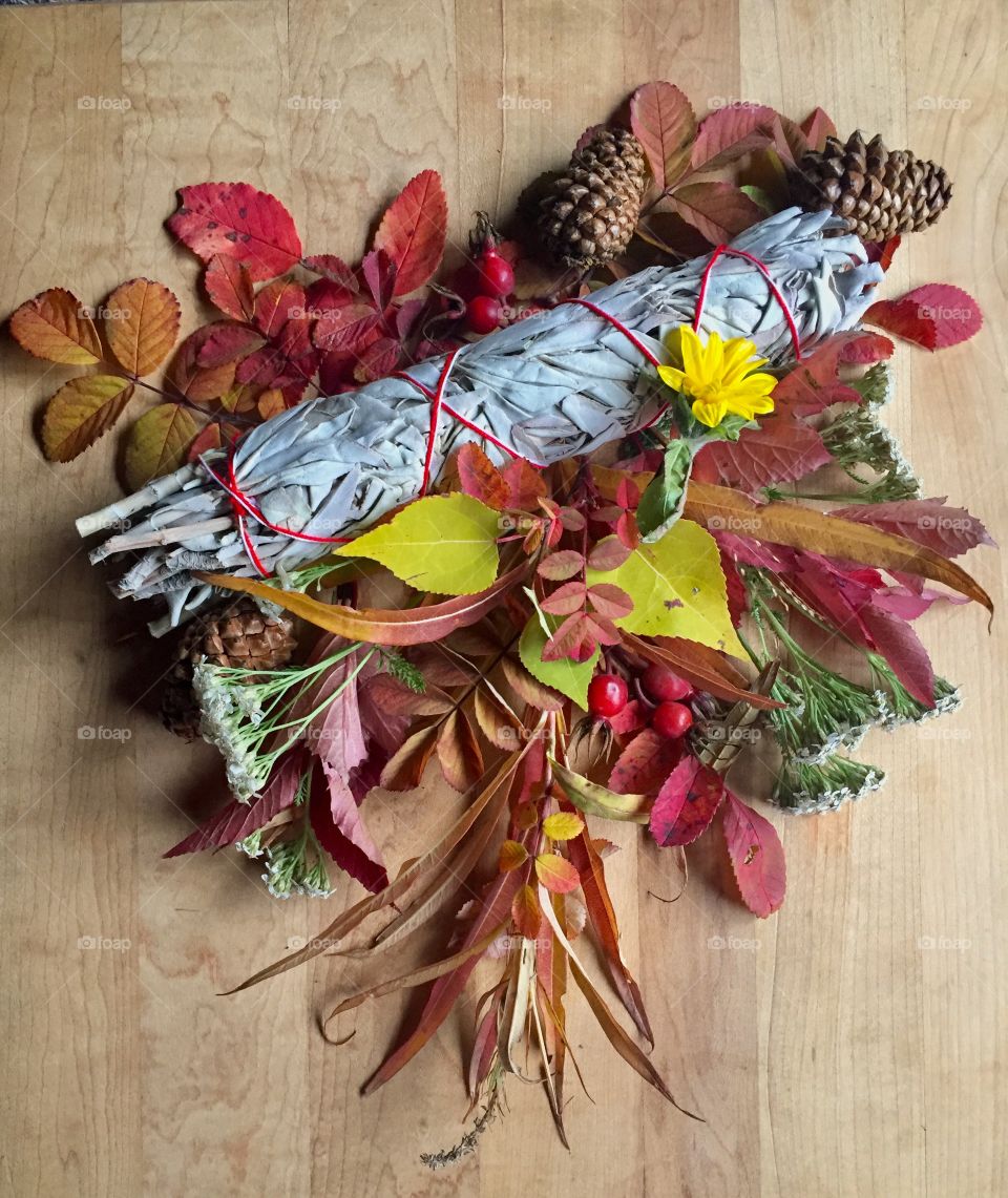 The Autumn Mabon centerpiece. A sage stick for cleansing. Just a little addition to the Pagan household. 