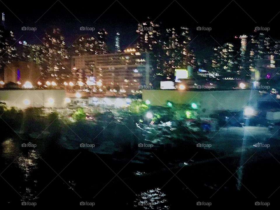 This is the view from the “Pulaski Bridge” on the “Greenpoint”, Bklyn side onto LIC, Queens and parts of “Manhattan” as a combined skyline. The bright lights of the big city appear sparklier and brighter than usual. 2022. Hypnotic Productions