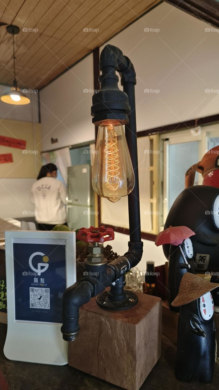 a closeup shot of a beautiful lamp on a wooden background