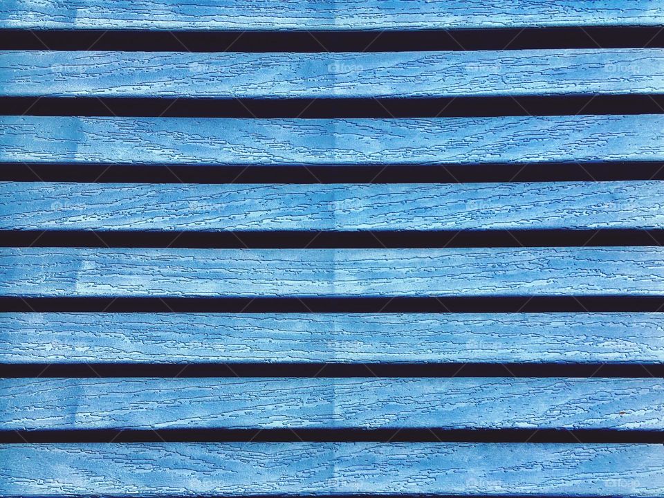 Blue wooden shutter close up texture background 