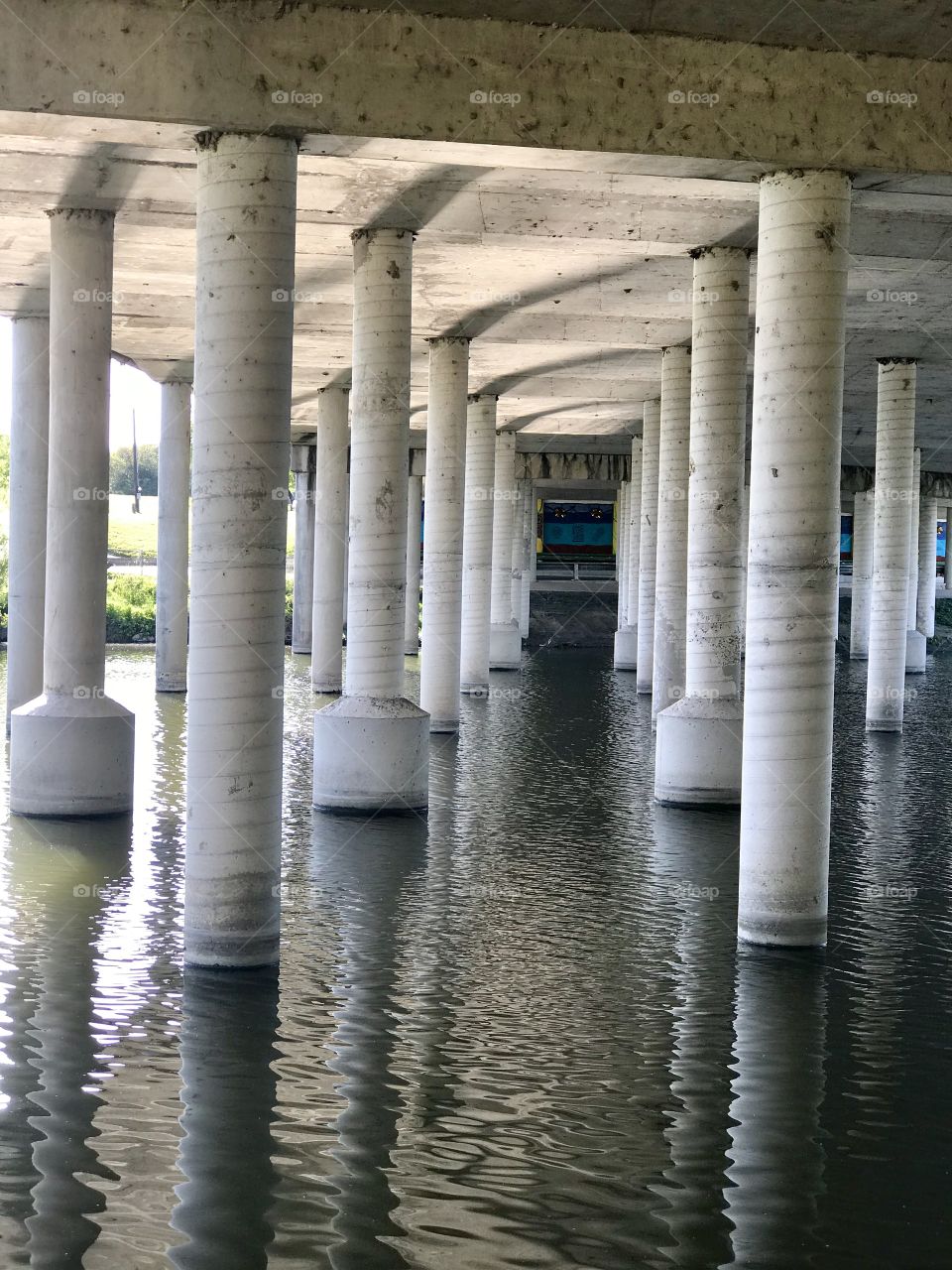 Pillars under a cement bridge