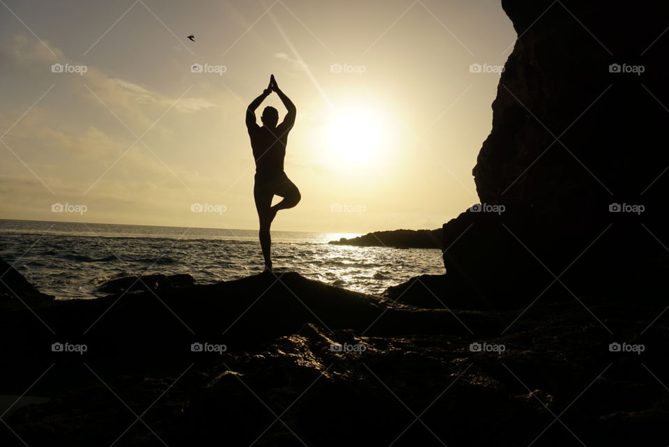 Sunrise#sea#rock#silhouette#human#balance