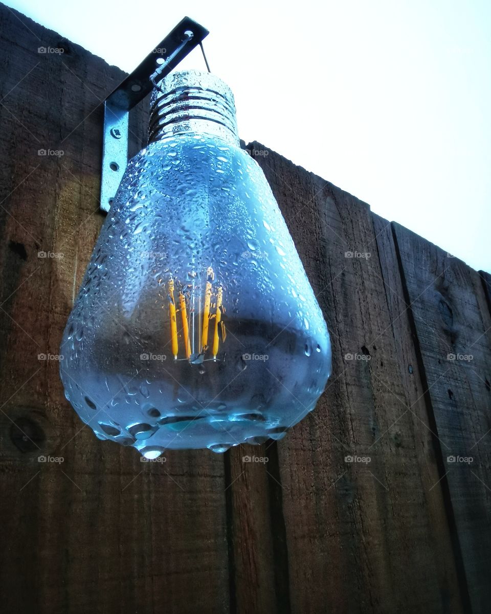 Solar bulb at dusk in the rain